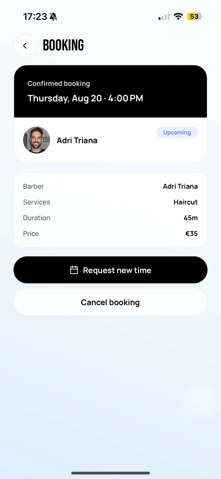 Empire Client: the confirmed booking showing barber, service, duration and price, with Request new time and Cancel booking still available