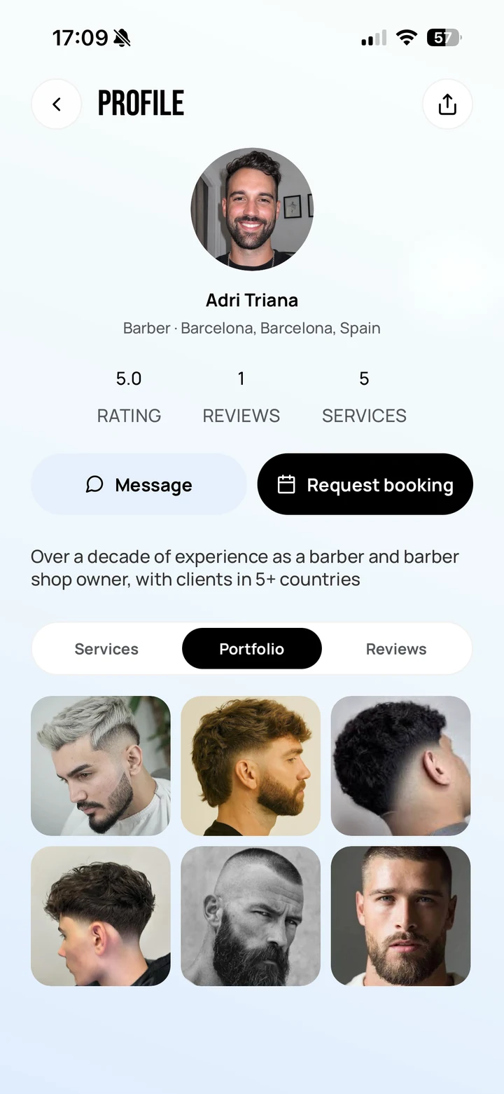 Empire Client: the Portfolio tab on a barber profile, a six-photo grid of the barber&rsquo;s work