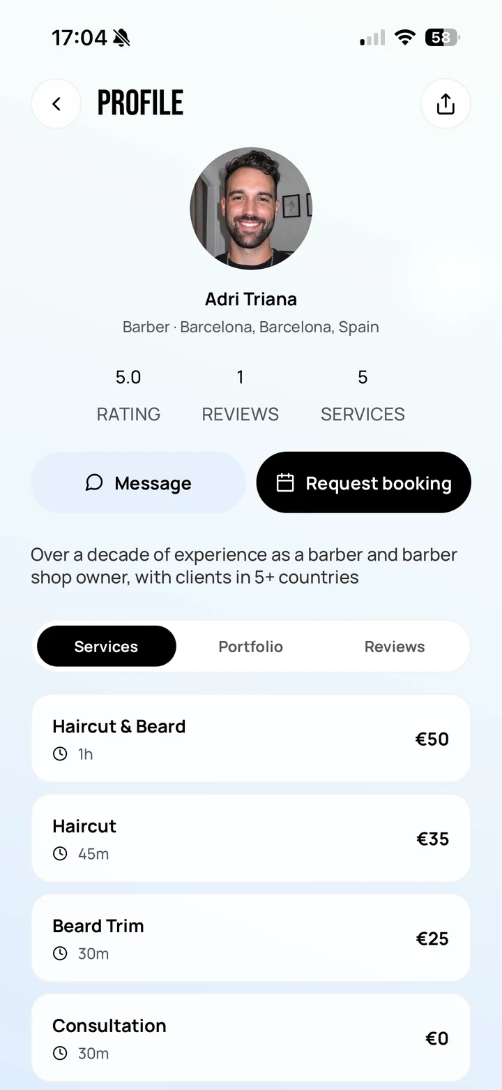 Empire Client: a barber profile showing rating, reviews and service count, Message and Request booking, and the Services tab listing each service with duration and price