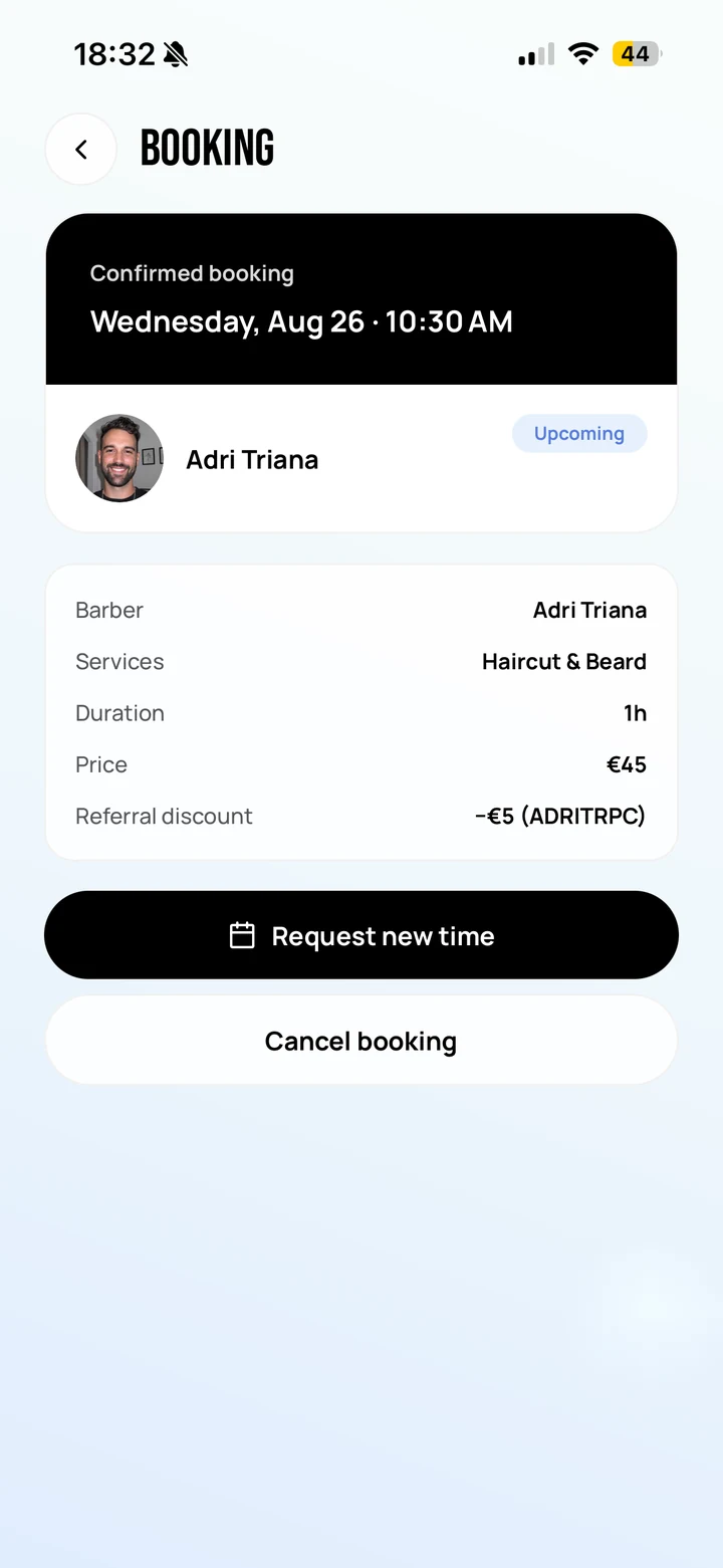 Empire Client: the same booking once confirmed, still itemising the referral discount against the code